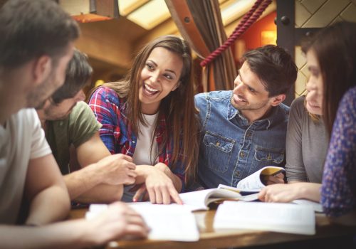 Student sharing her knowledge with her colleagues